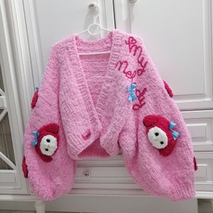 pnkimera - Handmade Kawaii Pink Cardigan – Cute Cartoon Inspired Knit Sweater with Plush Appliqué & Bows